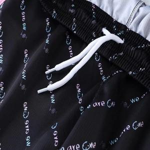 ชุดยูนิฟอร์มบาสเก็ตบอลแบบขายส่งสั่งทำพิเศษ เสื้อและกางเกงขาสั้น ชุดยูนิฟอร์มทีมแบบซับลิเมชั่น แห้งเร็ว ระบายอากาศได้ดี ชุดกีฬาสำหรับผู้ชายและผู้หญิง - Product Image 6