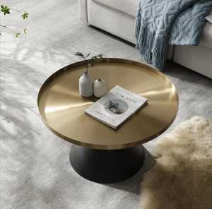 Mesa de centro moderna con tapa redonda, base acanalada negra y patas de latón para sala de estar, lista para la venta minorista. - Product Image 3