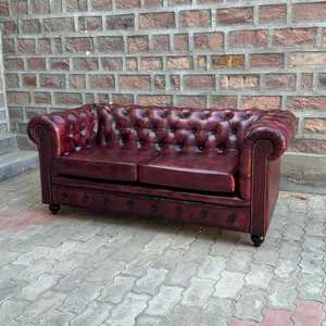 Sofá Chesterfield de Cuero Borgoña Premium con Botonadura Profunda, Brazos Enrollados, Adornos de Tachuelas, Estructura de Madera, Ecológico, en Forma de L - Product Image 1