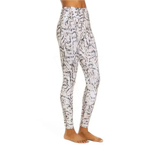 Leggings de yoga taille haute sans couture pour femme, couleur unie, en polyester/nylon, avec taille élastique et tissu extensible réfléchissant - Product Image 2