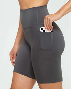 Shorts de compression en graphite pour femmes avec poches, taille haute, anti-transpiration, vente en gros - Product Image 3