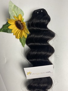 Cheveux bruts de haute qualité océan ondulé 100% cheveux humains DD SDD noir naturel trame unique/double trame fabriqués au Viet Nam - Product Image 6