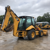 Vente flash : Chargeuse-pelleteuse Caterpillar 416E d'occasion avec moteur puissant