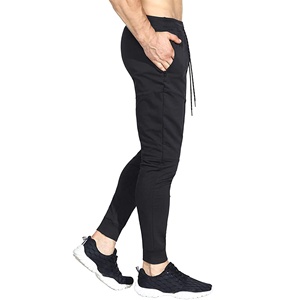 Venta al por mayor de chándales deportivos con bolsillo y cremallera para hombre con logotipo personalizado en blanco, pantalones deportivos para senderismo, pantalones de chándal para hombre - Product Image 4