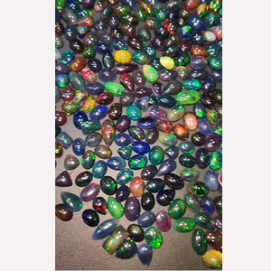 665 pièces d'opale noire éthiopienne naturelle avec reflets, de 8 mm à 16 mm, cabochons ovales, poire, octogone, 810 carats, pierres précieuses Iroc Sales, cabochons US$535 - Product Image 3