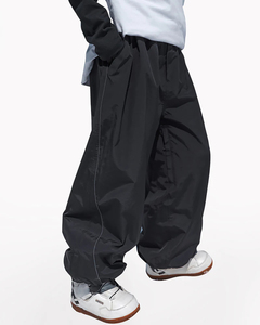 Pantalones de esquí holgados unisex negros, impermeables, con cintura elástica, material Gore-Tex, pantalones de snowboard para adultos con costuras selladas y aislamiento interior. - Product Image 1