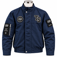 Blouson Bomber Homme Col Montant Beige avec Patch Logo Lettres Coupe-Vent Imperméable Décontracté Hiver Style Urbain