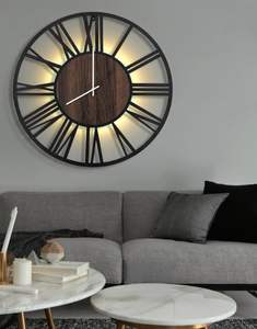 Los relojes de pared metálicos mantienen su forma y acabado incluso después de años de uso, creando un equilibrio visual entre otras decoraciones de pared. - Product Image 1