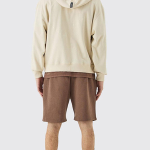 Shorts en coton noir pour homme avec découpes étoiles blanches, taille élastique, design géométrique décontracté, séchage rapide, tissu tricoté respirant - Product Image 5