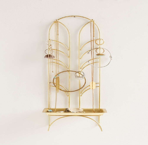 <b>Wall</b> mounted art deco style <b>gold</b> metal jewellery organizer stand with bottom <b>shelf</b> tray, available at wholesale prices. - Product Image 1