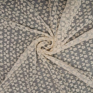 Tela de encaje ligera de malla con bordado floral diminuto y detalles de hilo Buti sobre una base de red blanca, la más vendida para vestidos. - Product Image 1