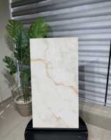 Carrelage en porcelaine effet marbre Calacatta Gold Premium Favolosa Macchia Oro