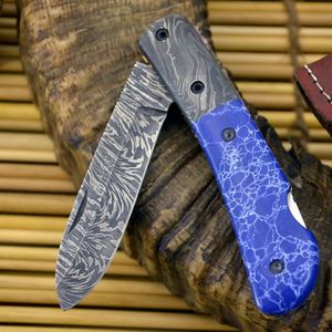 Navaja de bolsillo de acero de Damasco con hoja de punta caída, mango azul y apertura con perilla, para uso en exteriores y camping. - Product Image 1