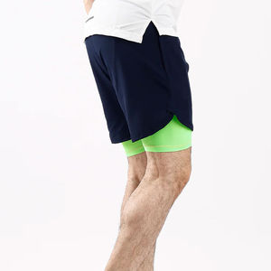 Pantalones Cortos Deportivos Negros de Secado Rápido para Hombre, Cintura Media, Cierre Elástico, Material Spandex, Bolsillos, Ribete Verde, Estilo Casual Urbano - Product Image 3