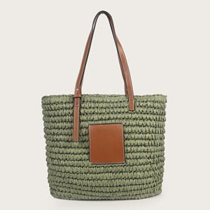 Complementa tus atuendos para el clima soleado con este encantador bolso de hilo natural con forma estructurada y detalles de cuero hoy. - Product Image 3