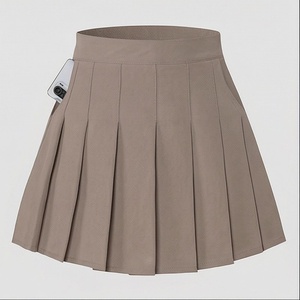 Jupe plissée mini pour femme, couleur unie, taille élastique, respirante, en polyester, à porter en toutes saisons - Product Image 1