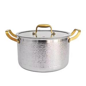 Olla de acero inoxidable más vendida con tapa de vidrio, ideal para cocinar con metal, que promueve la confianza en una cocina de alto calor y gran sabor. - Product Image 1