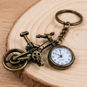 Custom Polished Modern Antique Brass Keychain with Quartz Clock Gold-Plated Metal Craft Carved Collectible Decor - Product Image 1