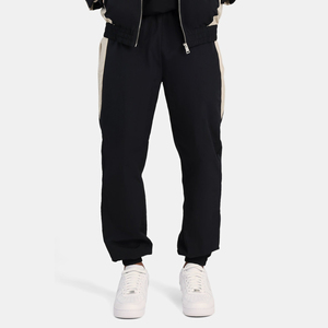 Ensemble de survêtement pour homme noir à blocs de couleur, veste zippée et pantalon, coupe décontractée avec poches latérales, idéal pour l'automne - Product Image 3