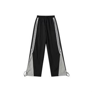 Pantalon de survêtement évasé vintage 2026 pour homme avec logo personnalisé, rayures droites et courbes, en nylon, coupe coupe-vent, OEM - Product Image 3