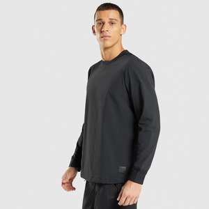 Pull-over Performance Techwear pour homme - Haut d'entraînement léger et résistant au vent à manches longues avec poignets côtelés en noir jais - Product Image 2