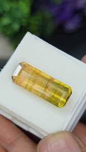 พลอยแทนซาไนต์ธรรมชาติสองสี รูปทรงแปดเหลี่ยมยาว สีเหลืองเขียวพีช ของ Zubeda Gems พร้อมใบรับรองจากผู้เชี่ยวชาญที่ไม่ใช่ฝ่ายใด สามารถเปลี่ยนสีได้ - Product Image 5