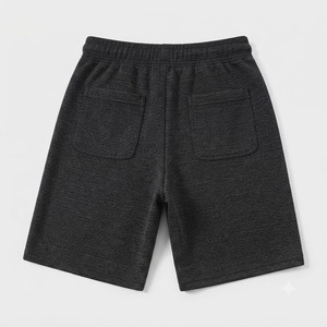 Shorts de survêtement en tricot noir pour homme, taille élastique avec cordon de serrage, coupe décontractée ample avec poches latérales, respirant, idéal pour l'été - Product Image 2