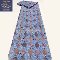 Tela de malla bordada con textura geométrica para la confección de vestidos modestos, abayas, caftanes y prendas de moda.