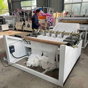 Nouvelle machine de rembobinage de papier toilette entièrement automatique avec système d'alimentation par bobine et de levage par vérin pneumatique, haute qualité, 100 m/min - Product Image 1
