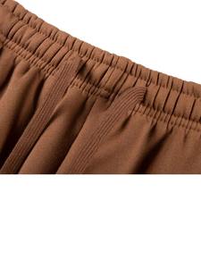 Conjunto deportivo acampanado y holgado con forro polar suave, cintura elástica y pantalones de pierna ancha para un estilo relajado pero cómodo. - Product Image 6