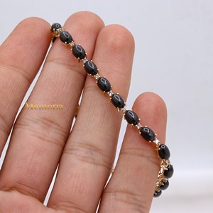 กำไลข้อมือทองคำ 14K ประดับพลอยแบล็คสตาร์ทรงคาโบชองธรรมชาติ |   เครื่องประดับเพชรแบบยูนิเซ็กซ์ ราคาขายส่ง - Product Image 2