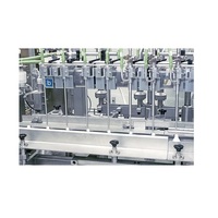 Machine de remplissage et de bouchage automatique de liquides de qualité supérieure pour les lignes de production d'eau en bouteille, de jus et de boissons, à vendre
