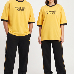 Ensemble de survêtement unisexe en coton avec t-shirt à manches courtes et pantalon large à coupe décontractée, style streetwear athlétique en polyester - Product Image 3