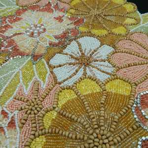 Camino de mesa floral con cuentas y lentejuelas de Pier 1 Imports - Product Image 1