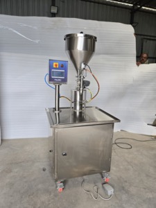 Machine de remplissage semi-automatique électrique numérique à piston en acier inoxydable avec contrôle PLC pour miel, gel et eau pure - Product Image 2