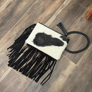 2025 lujo piel de vaca cuero flecos brazalete embrague nuevo diseñador bolso Sling Bag pelo en piel oculta bolso multiuso de mujer - Product Image 5