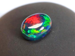 Gorgeous Ethiopian Black Opal Gemstone Oval Shape Glowing <b>Rainbow</b> Flashy Black Opal Cabochon At Wholesale Price - Product Image 1