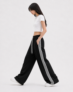 Pantalon large pour femme à rayures latérales, taille élastique avec cordon de serrage, style sportif décontracté, coupe ample, bas de tenue athleisure urbaine - Product Image 1