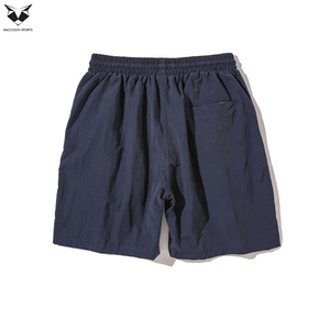 Shorts en nylon tendance pour hommes, avec poches zippées, imprimé graphique, logo personnalisé, qualité supérieure, vente en gros, style streetwear et sportswear - Product Image 5