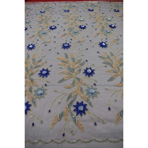 Tissu de robe de mariée brodé de perles au design fantaisie, le plus vendu, pour l'exportation en gros aux acheteurs d'usine du monde entier - Product Image 1