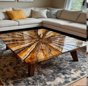 This modern <b>round</b> resin <b>table</b> showcases a perfect blend of organic <b>wood</b> shapes and blue fill, available at wholesale prices. - Product Image 3