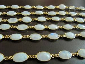 Chaîne connectrice en pierre de lune arc-en-ciel blanche naturelle, forme ovale, facettée, style briolette - Product Image 1