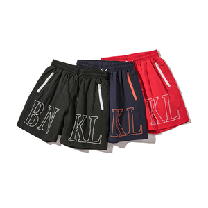 Vêtements de sport streetwear en gros – Pantalon décontracté pour homme à taille élastique, imprimé graphique, qualité supérieure, logo personnalisé, nouveau modèle tendance en nylon - Product Image 1