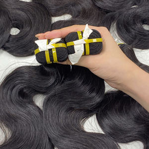 Extensiones de cabello humano vietnamita ondulado de cuerpo negro natural de alta calidad al por mayor 100% extremos doblemente dibujados para tejer - Product Image 6