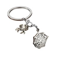 Llavero de aleación con diseño de telaraña calada y cadena para decoración de mochila de Halloween