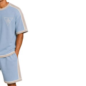 เสื้อยืดโอเวอร์ไซส์สีฟ้าอ่อนสำหรับผู้ชายและกางเกงขาสั้นชุดเซ็ตสีเบจตัดต่อแผงสีตัดกัน โลโก้แบบกำหนดเอง คอกลม สไตล์ลำลอง สตรีทแวร์ ขายส่ง - Product Image 4