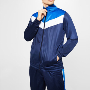 Ensemble de survêtement pour homme en polyester bleu avec veste zippée et pantalon à rayures latérales, idéal pour le sport et le jogging - Product Image 4