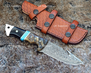 Cuchillo de acero de Damasco con gancho para tripas, hoja fija de punta caída, 0.5mm de grosor, para camping y bushcraft, con incrustaciones de turquesa y mango de cuerno de carnero, con funda de cuero - Product Image 4
