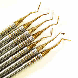 Juego de 7 piezas de Dique de Goma Endodóntico, Espátula Manual para Relleno de Resina, Cabeza de Titanio Chapada en Oro, Acero Inoxidable Grado A+, Certificado CE - Product Image 4