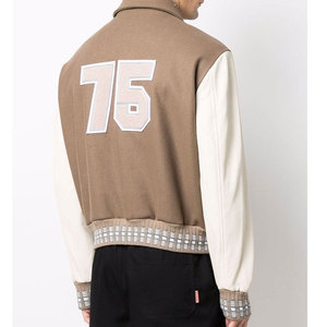 Veste Letterman tendance avec empiècements patchwork et un design de panneaux élégant, idéale pour la mode urbaine en hiver. - Product Image 4